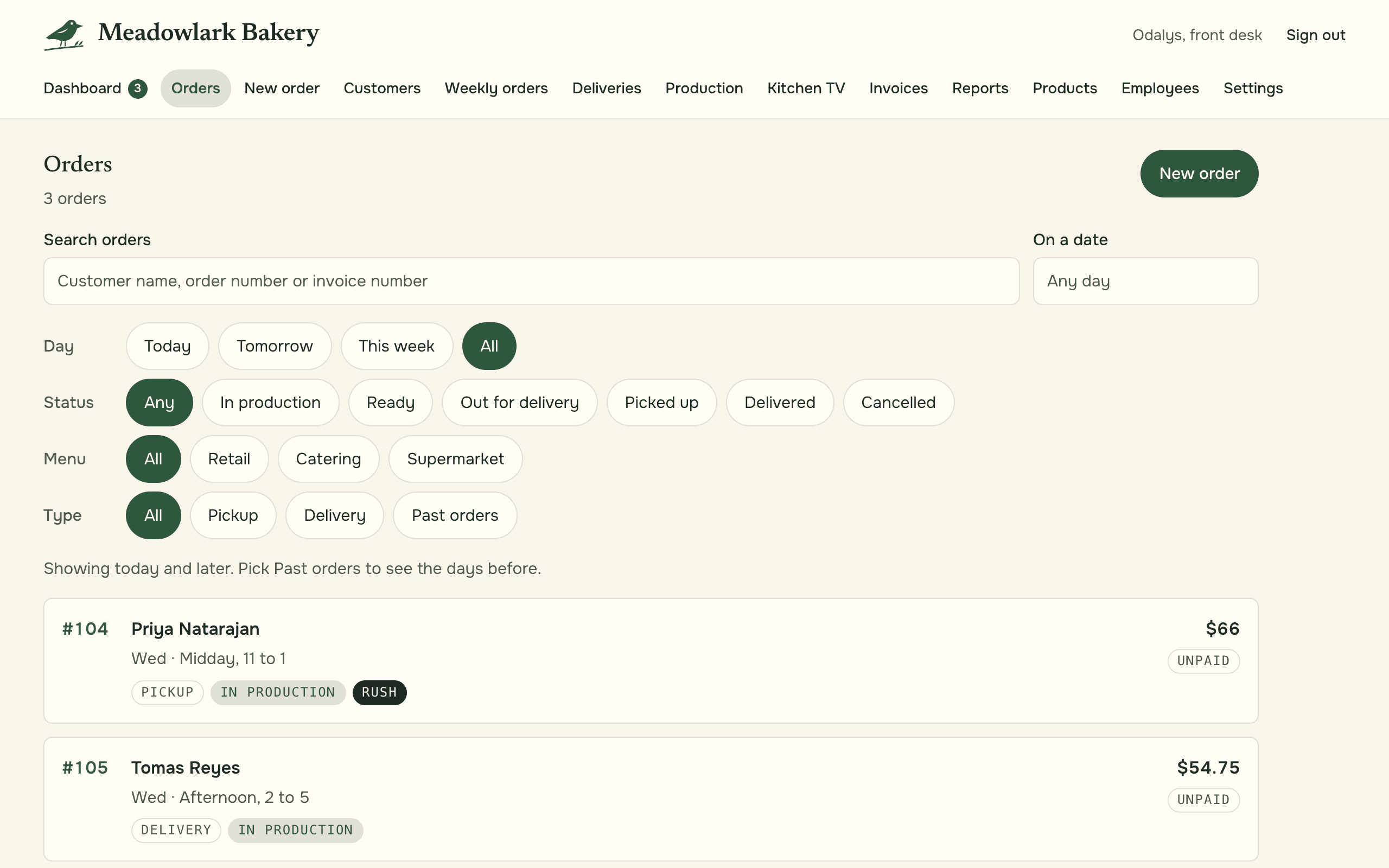 The orders screen at laptop width: the menu across the top, filters for day, status, menu and type, then a card for each order with its customer, when it is due, its status and the amount.